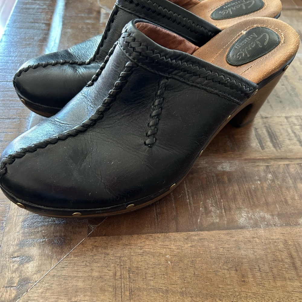 Clarks Black Leather Mules with Polished Finish